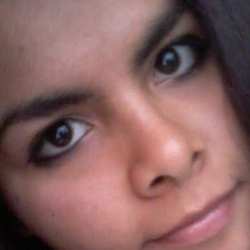 Angie Montes (Aisha)