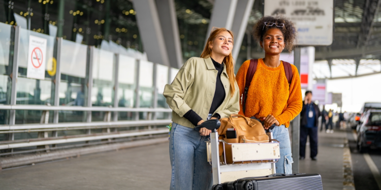 two girls traveling together