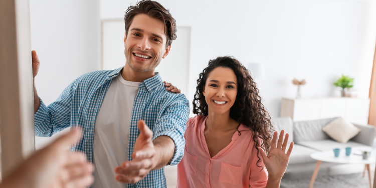 couple welcoming guests