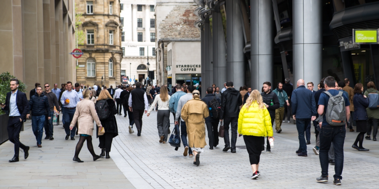 people walking in the street in London
