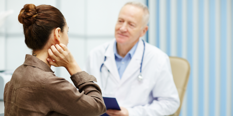 patient explaining issue to doctor