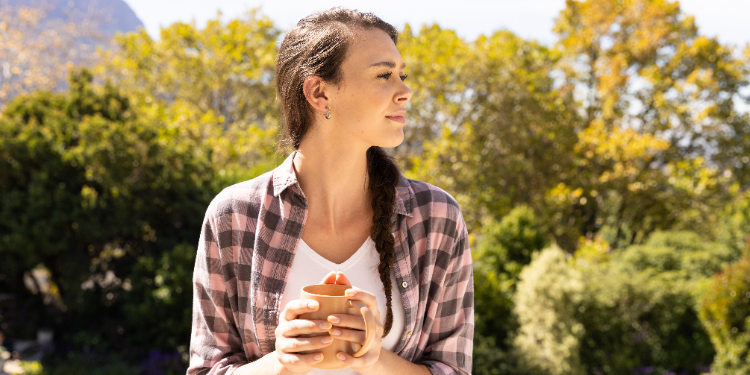 young woman taking a coffee