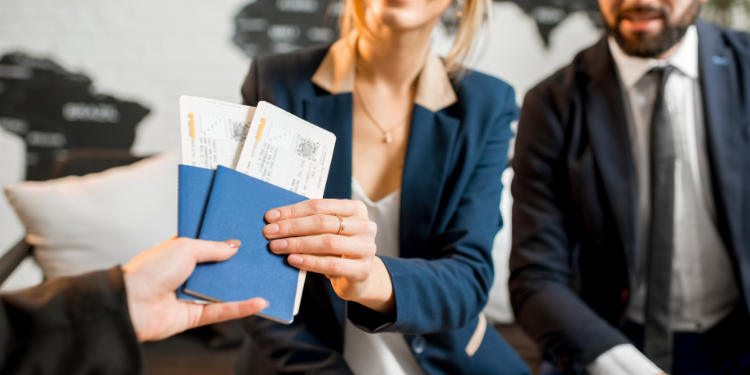 couple tendering their passports