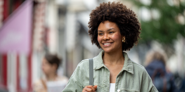 trendy woman walking in the street