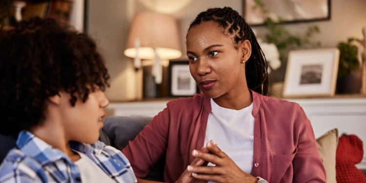 woman talking to teen son