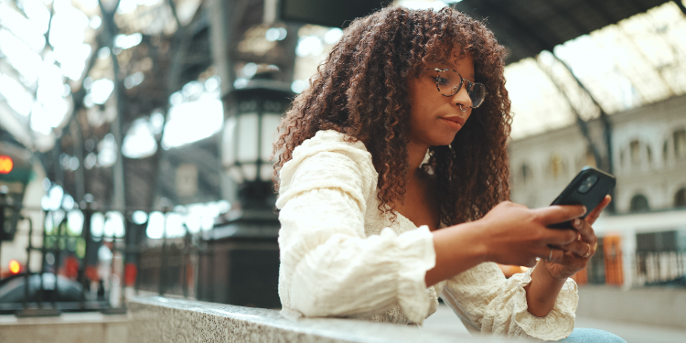woman sending text message