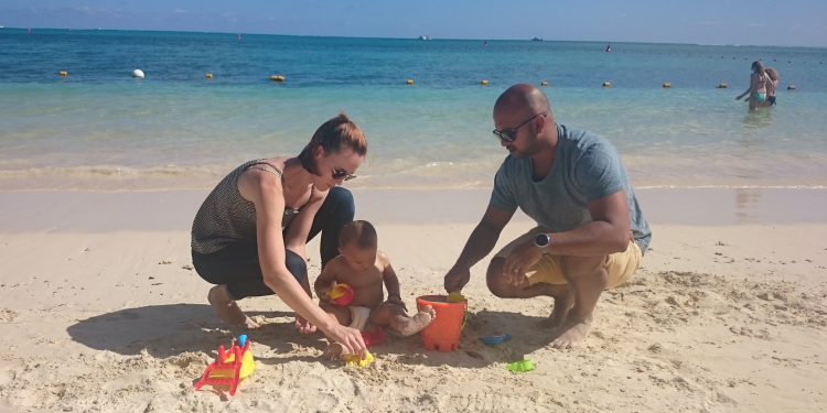 Family on the beach in Mauritius