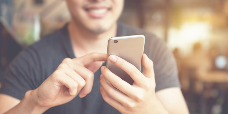 young man using smartphone