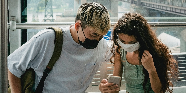 couple looking at mobile app