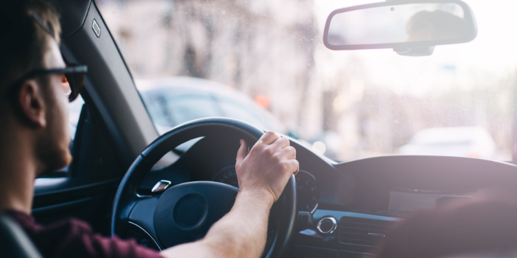 young man driving