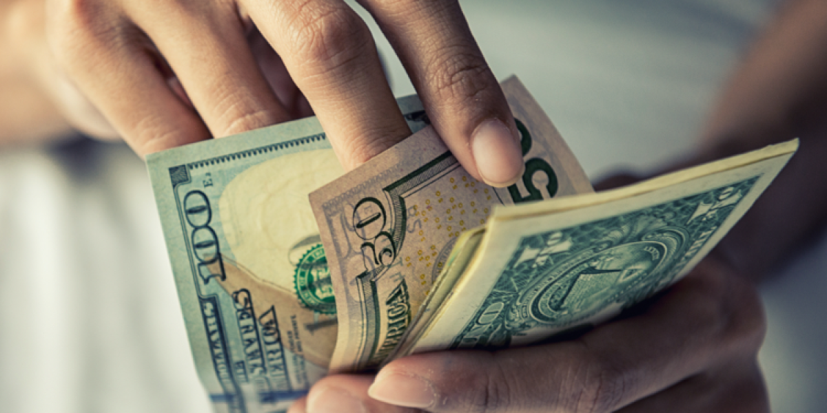 hand counting dollars