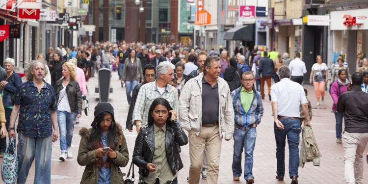 people walking in busy street in the Netherlands