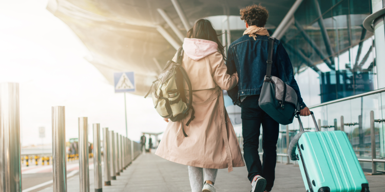 young couple at airport