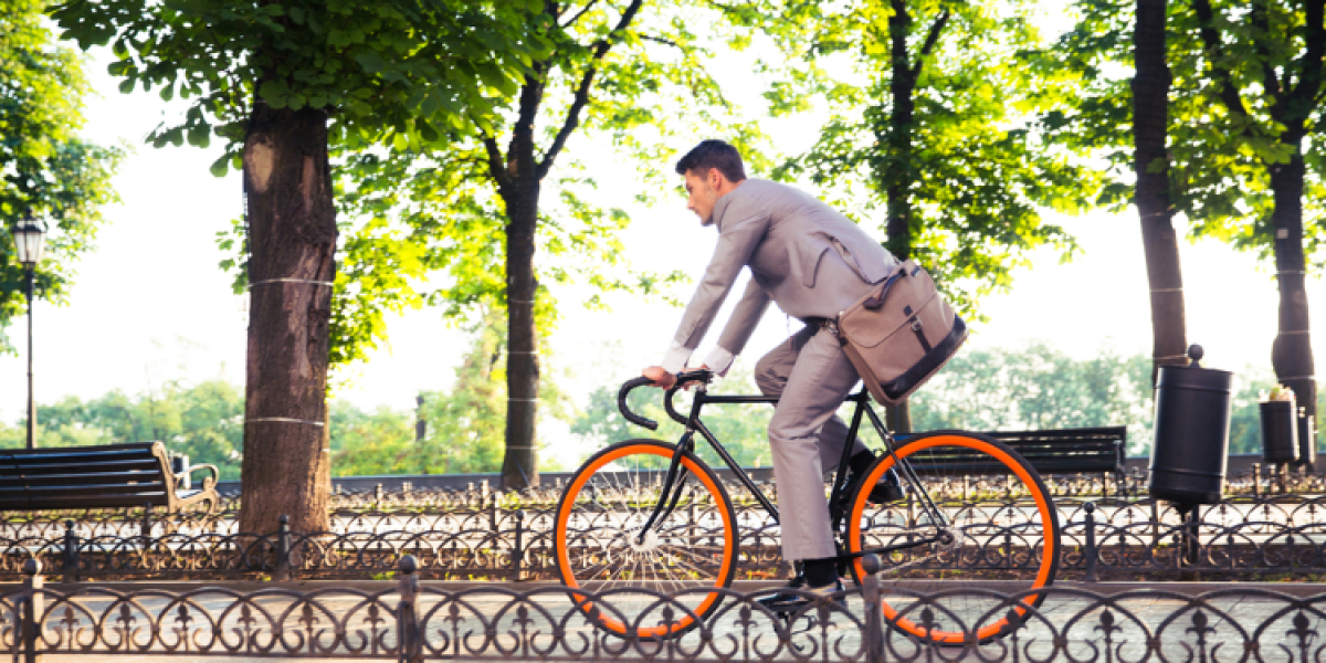 young man riding a bike