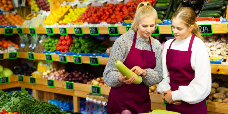 young part-time worker at mini-market