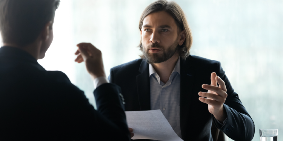 employer and employee in discussion