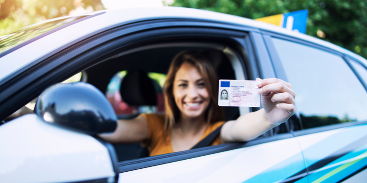 woman showing driver's license
