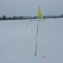 Jugando a golf en campos nevados