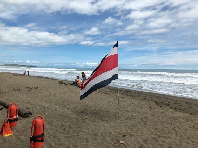 Costa Rica flag on beach