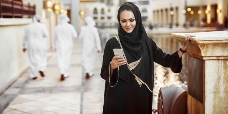 arab woman using phone