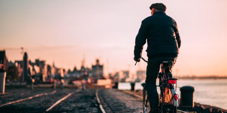 old man riding bicycle