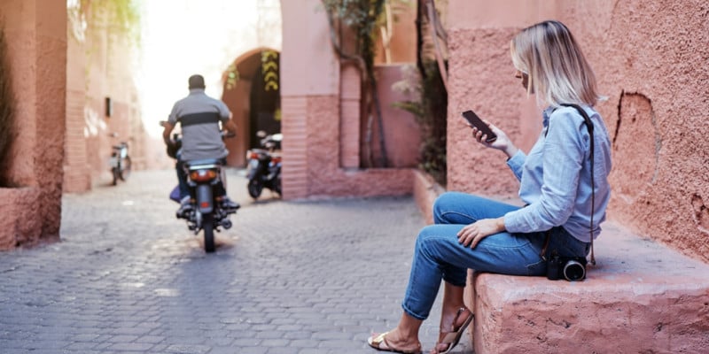 young woman looking at phone