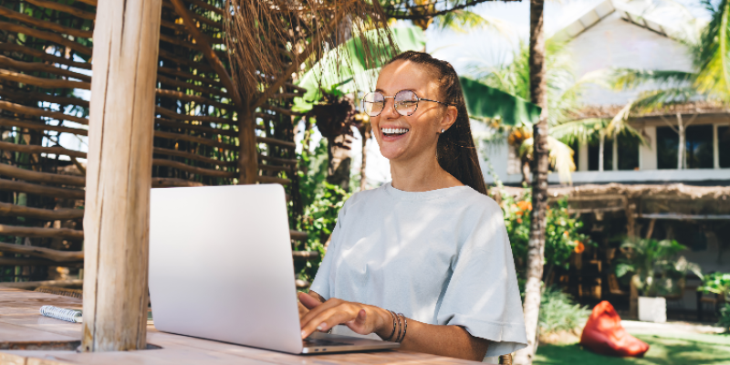 young woman working remotely in Costa Rica