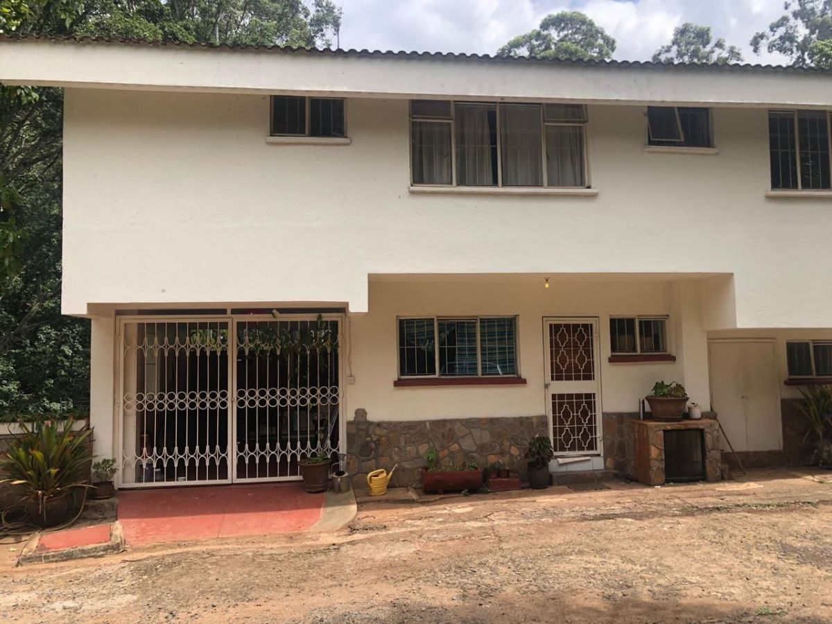 In a gated community of nine townhouses lies this fourbedroom ensuite townhouse, House for