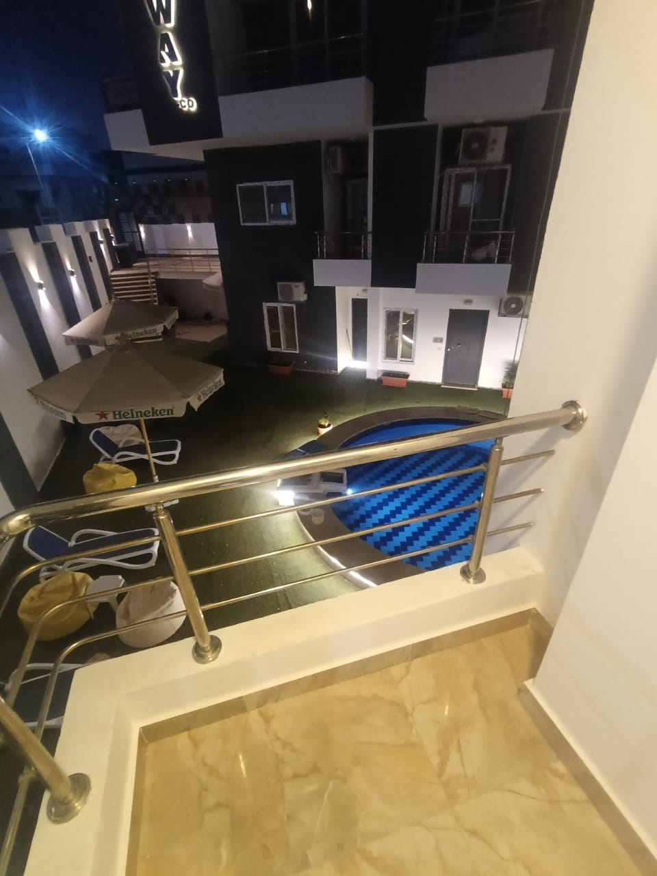 For sale: 60 sqm apartment in Magawish, inside a residential compound, with a direct view of the swimming pool and the street. The apartment consists of one bedroom, a living room,  