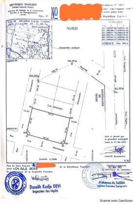 Parcelle solidement clôturée de 04 lots collés avec 02 ...