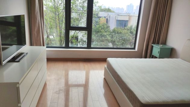 Duplex with open roof terrace next to Jinji lake and Suzhou center