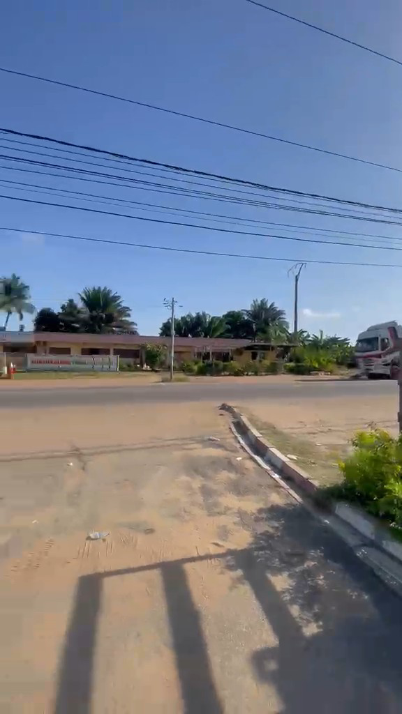 Bassam, roadside plot of 1200 m² with warehouse, shop, showroom, and office 