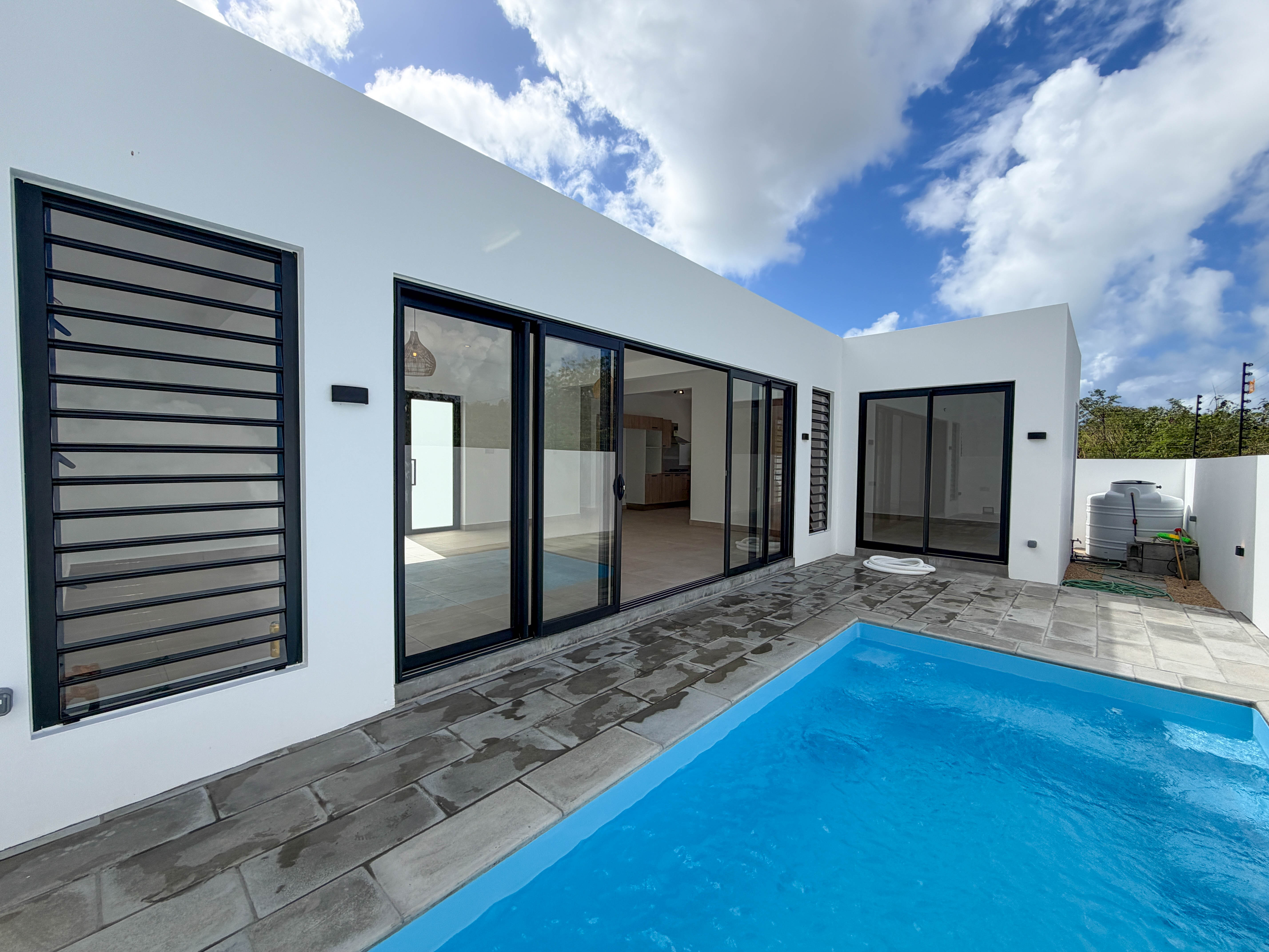 FOR SALE - A BRAND NEW 3-BEDROOM VILLA WITH PRIVATE POOL IN GRAND BAY, RS 11M