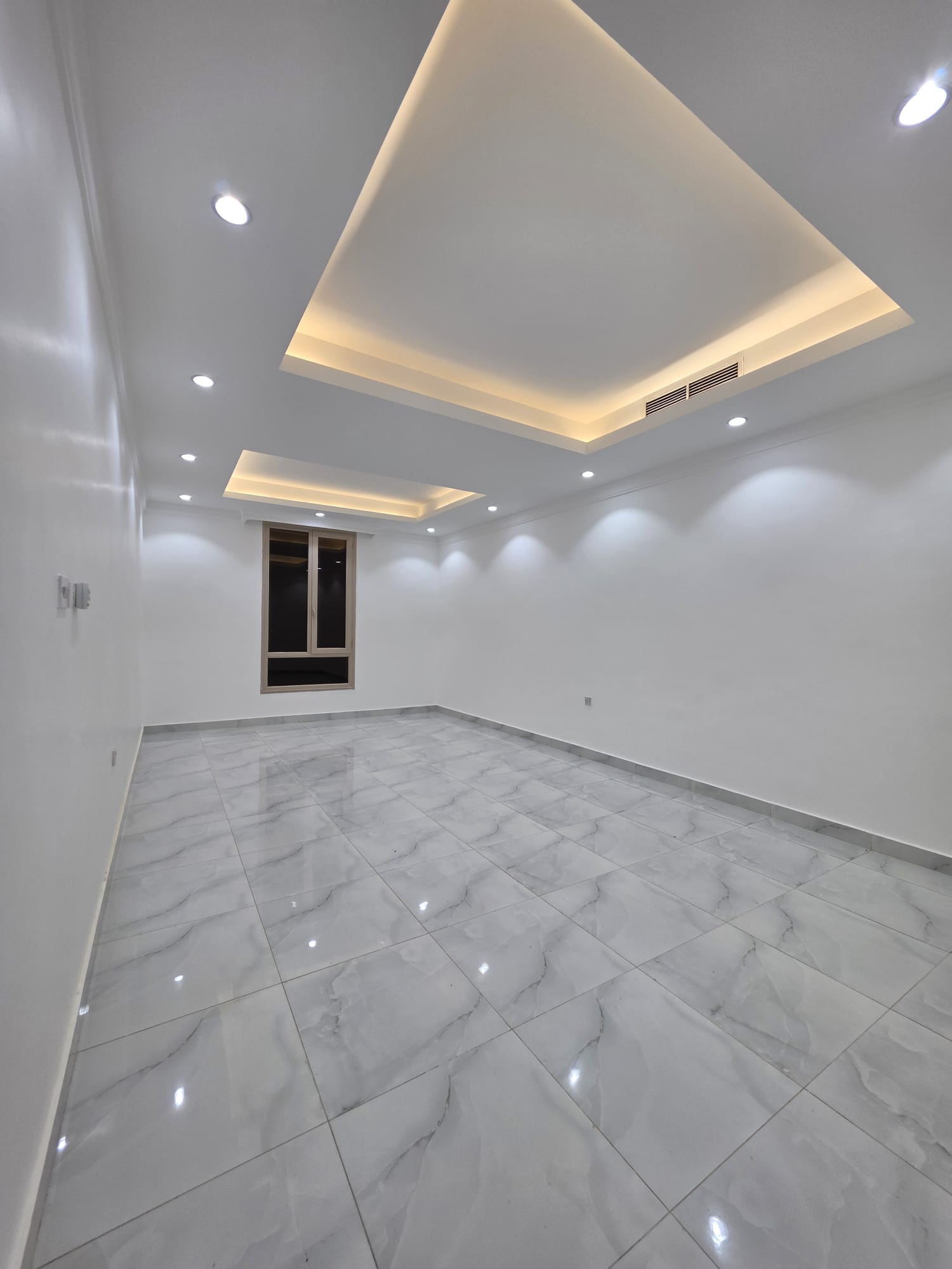 Apartment for rent in Salwa consisting of a living room, guest bathroom, and three master bedrooms.
